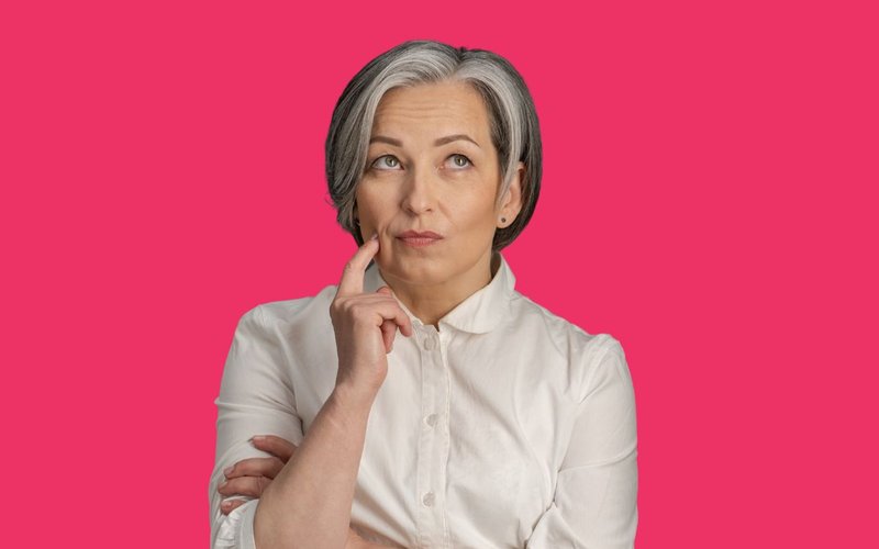Middle aged woman thinking