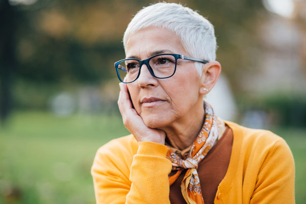 Older woman looking into distance