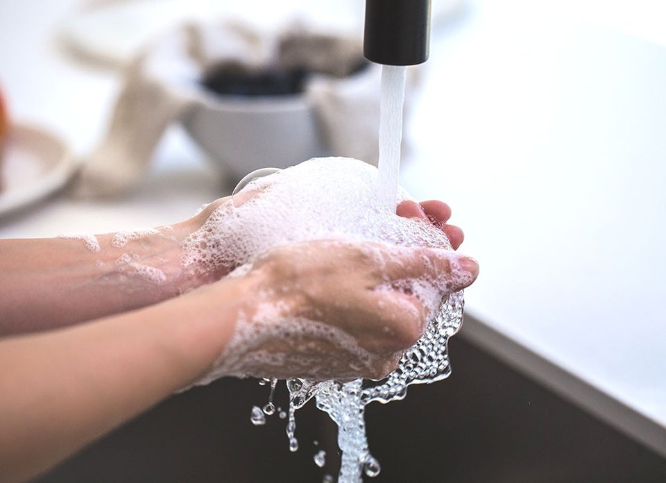 Person-washing-their-hands.jpg