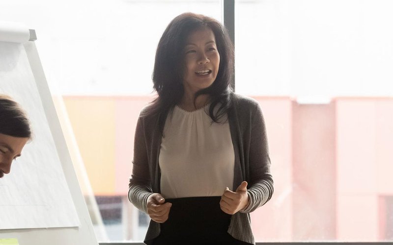 woman leading a workplace presentation